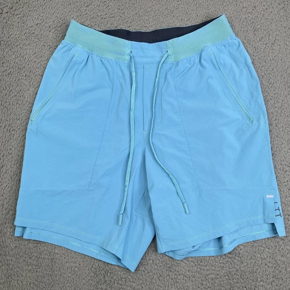 Lululemon License To Train LTT Shorts Mens Small Light Blue Zip Pockets Drawcord